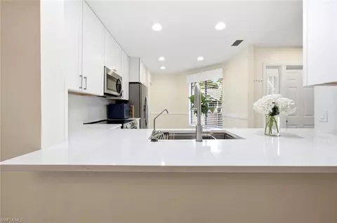 Kitchen - 506 Courtside Dr #E201, Naples, FL 34105 photo 3 of 4