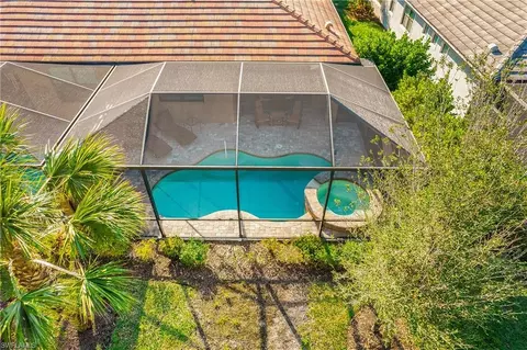 Exterior - 7674 Jacaranda Ln, Naples, FL 34114 photo 7 of 12
