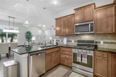 Kitchen - 7674 Jacaranda Ln, Naples, FL 34114 photo 1 of 2