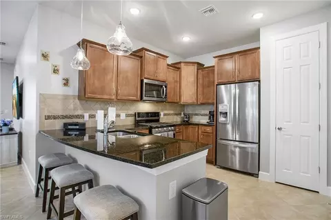 Kitchen - 7674 Jacaranda Ln, Naples, FL 34114 photo 2 of 2