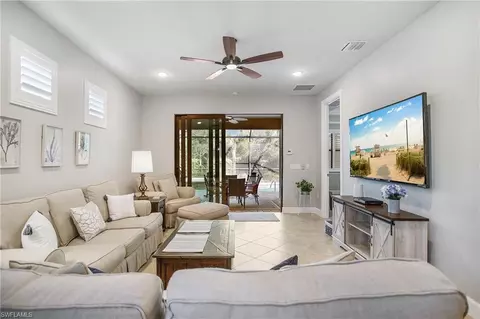 Living - 7674 Jacaranda Ln, Naples, FL 34114 photo 2 of 3