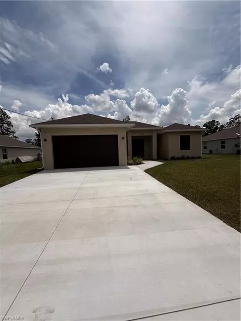 469 Woodman Dr, Lehigh Acres, FL 33972