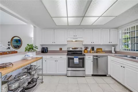 Kitchen - 151 Cypress Way E #C103, Naples, FL 34110 photo 1 of 3