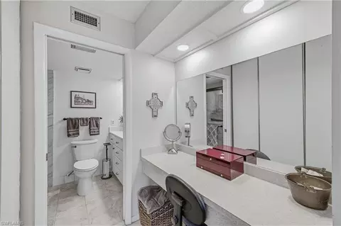 Bath - 151 Cypress Way E #C103, Naples, FL 34110 photo 1 of 3