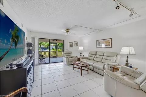 Living - 151 Cypress Way E #C103, Naples, FL 34110 photo 1 of 3