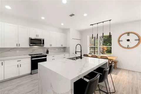 Kitchen - 1380 Areca Cv, Naples, FL 34119 photo 3 of 4