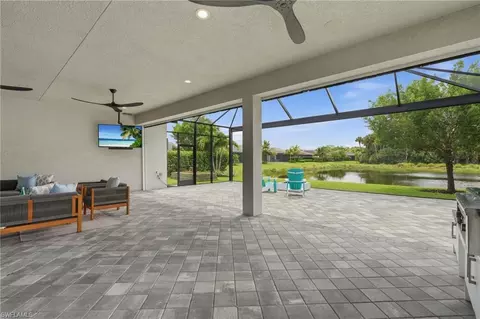 Exterior - 11636 Periwinkle Dr, Naples, FL 34120 photo 3 of 6