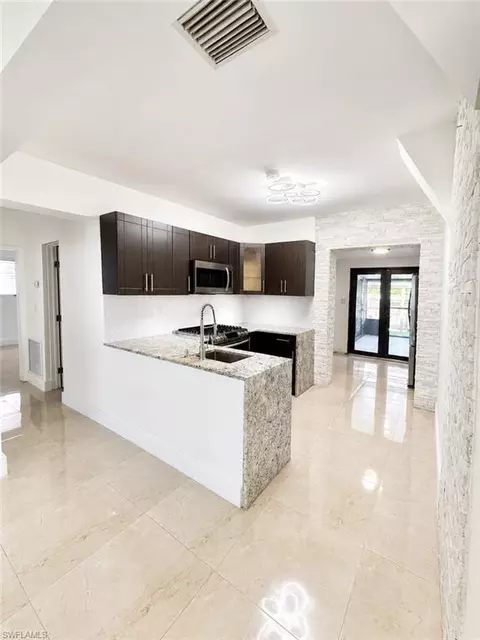 Kitchen - 4590 E 9th Ln, Hialeah, FL 33013 photo 1 of 3