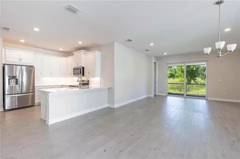 Living - 1050 Enbrook Loop, Naples, FL 34114 photo 1 of 2