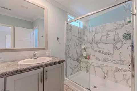 Bath - 585 Cape Florida Ln, Naples, FL 34104 photo 2 of 3