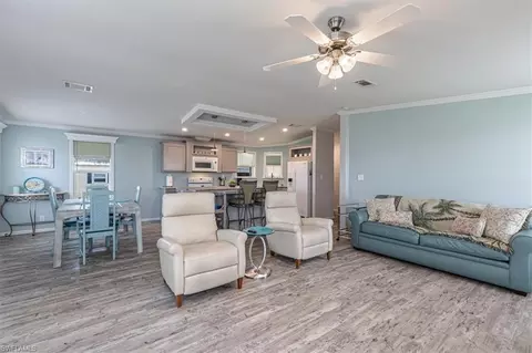 Living - 585 Cape Florida Ln, Naples, FL 34104 photo 3 of 3