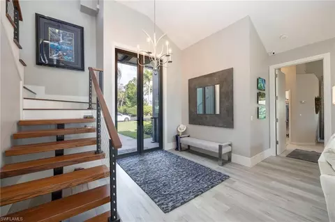 Entry Way - 549 Eagle Creek Dr, Naples, FL 34113 photo 1 of 3