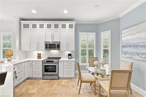 Kitchen - 7598 Moorgate Point Way, Naples, FL 34113 photo 3 of 5