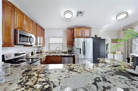 Kitchen - 5018 Eclipse Ct, Naples, FL 34104 photo 4 of 4