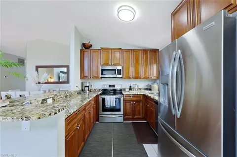 Kitchen - 5018 Eclipse Ct, Naples, FL 34104 photo 3 of 4