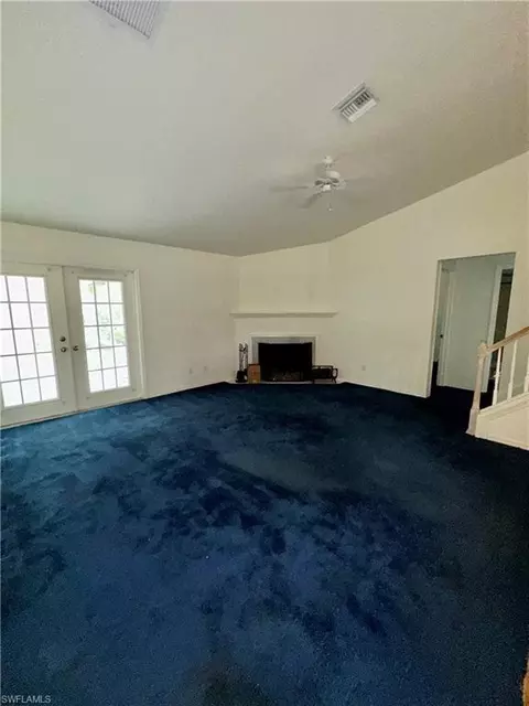 Living - 3740 45th Ave NE, Naples, FL 34120 photo 1 of 2