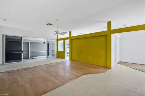 Living - 6522 Ilex Cir, Naples, FL 34109 photo 2 of 3
