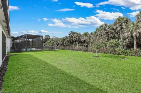 Exterior - 12255 Bonnet Dr, Naples, FL 34120 photo 5 of 8