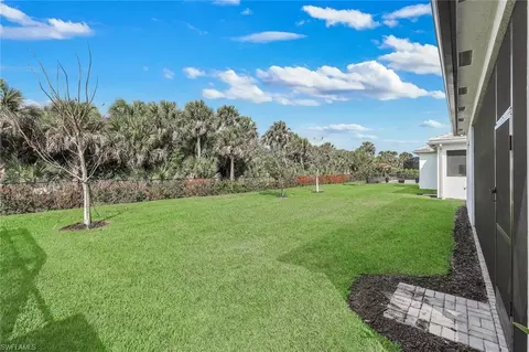 Exterior - 12255 Bonnet Dr, Naples, FL 34120 photo 4 of 8