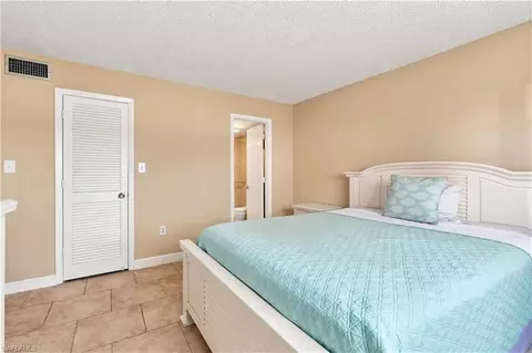 Bedroom - 170 Turtle Lake Ct #109, Naples, FL 34105 photo 7 of 7