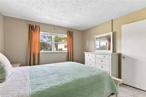 Bedroom - 170 Turtle Lake Ct #109, Naples, FL 34105 photo 5 of 7