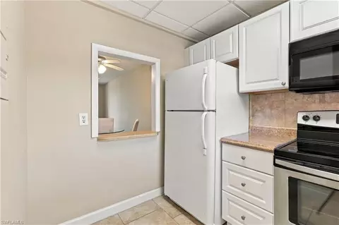 Kitchen - 170 Turtle Lake Ct #109, Naples, FL 34105 photo 3 of 3