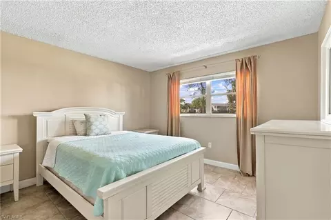 Bedroom - 170 Turtle Lake Ct #109, Naples, FL 34105 photo 4 of 7