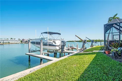 Exterior - 125 Pago Pago Dr E, Naples, FL 34113 photo 6 of 9