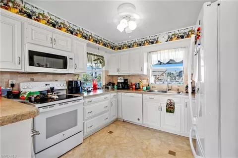 Kitchen - 125 Pago Pago Dr E, Naples, FL 34113 photo 3 of 3
