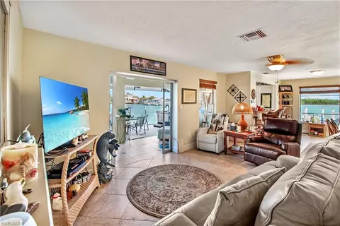 Living - 125 Pago Pago Dr E, Naples, FL 34113 photo 2 of 2