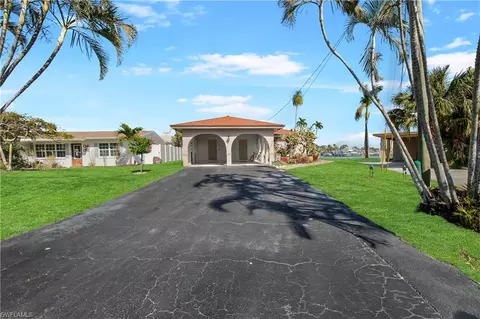 Exterior - 125 Pago Pago Dr E, Naples, FL 34113 photo 1 of 9