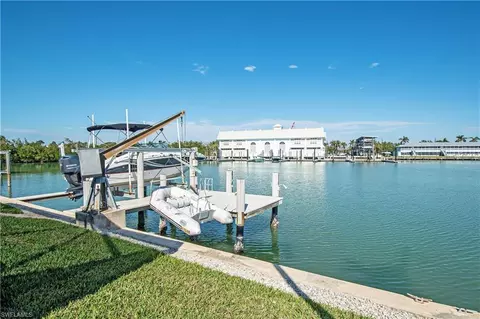 Exterior - 125 Pago Pago Dr E, Naples, FL 34113 photo 7 of 9