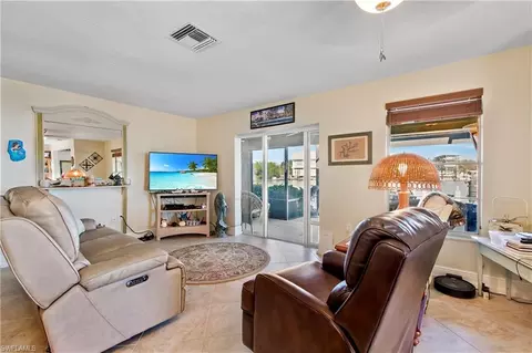 Living - 125 Pago Pago Dr E, Naples, FL 34113 photo 1 of 2