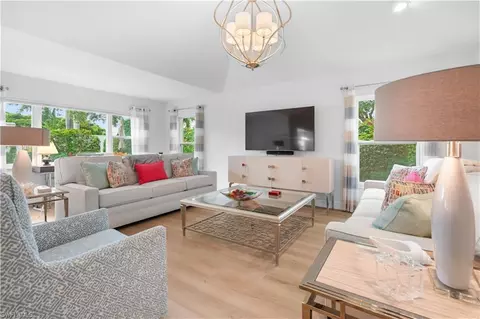 Living - 807 Rue Deville #2.11, Naples, FL 34108 photo 1 of 4