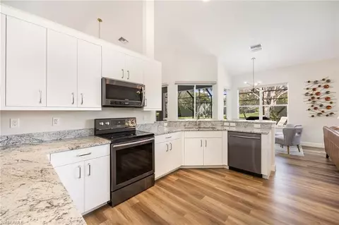 Kitchen - 9049 Bronco Ct, Naples, FL 34113 photo 2 of 3