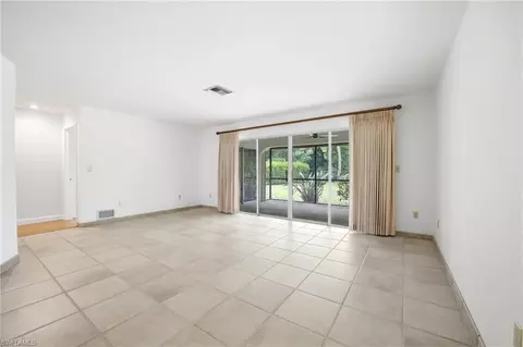 Living - 3066 Round Table Ln, Naples, FL 34112 photo 2 of 3