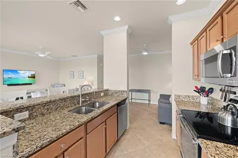 Kitchen - 9820 Giaveno Cir #1446, Naples, FL 34113 photo 4 of 4