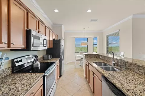 Kitchen - 9820 Giaveno Cir #1446, Naples, FL 34113 photo 2 of 4
