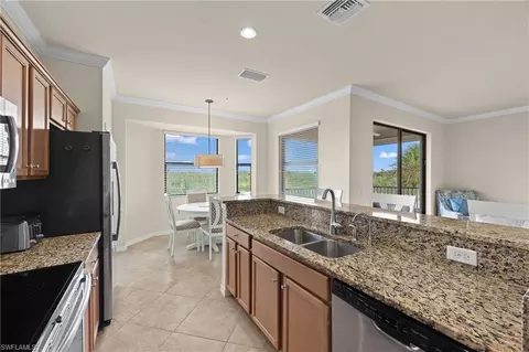 Kitchen - 9820 Giaveno Cir #1446, Naples, FL 34113 photo 3 of 4