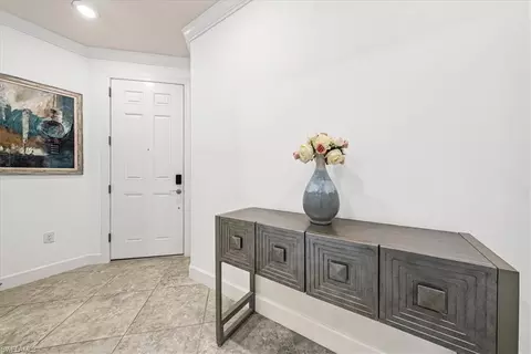 Entry Way - 7670 Jacaranda Ln, Naples, FL 34114 photo 1 of 2