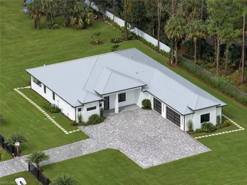 Exterior - 98 10th St NE, Naples, FL 34120 photo 6 of 7