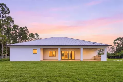Exterior - 98 10th St NE, Naples, FL 34120 photo 1 of 7