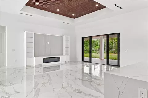 Living - 98 10th St NE, Naples, FL 34120 photo 3 of 5