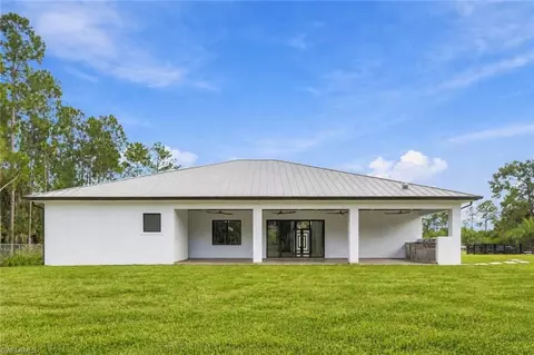 Exterior - 98 10th St NE, Naples, FL 34120 photo 5 of 7
