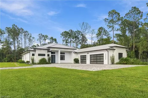 Exterior - 98 10th St NE, Naples, FL 34120 photo 3 of 7