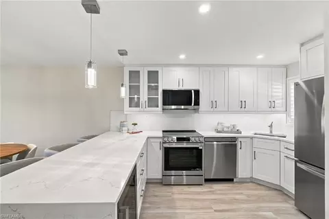Kitchen - 29 High Point Cir E #204, Naples, FL 34103 photo 6 of 7