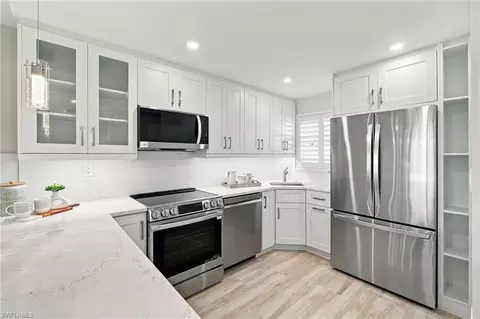 Kitchen - 29 High Point Cir E #204, Naples, FL 34103 photo 7 of 7