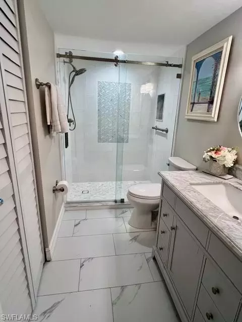 Bath - 1075 Foxfire Ln #310, Naples, FL 34104 photo 2 of 5