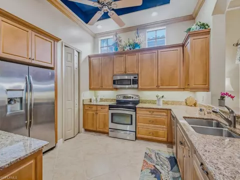 Kitchen - 5765 Mango Cir, Naples, FL 34110 photo 1 of 2