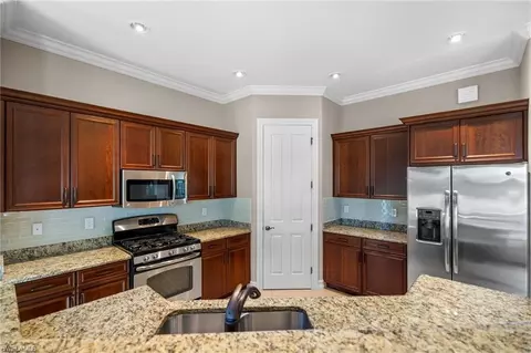 Kitchen - 6324 Serano Way, Naples, FL 34113 photo 2 of 5